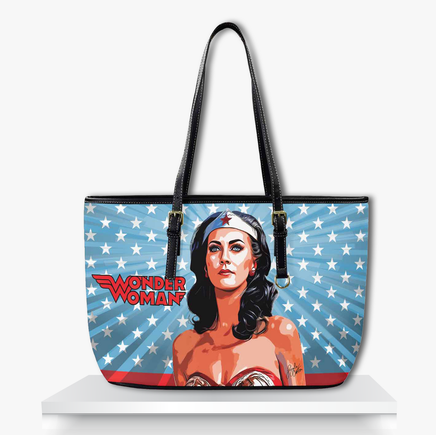 Patriotic Wonder Woman tote bag featuring a bold illustrated portrait of the iconic superhero against a blue starburst background with white stars and red accents — stylish comic book-inspired handbag for superhero fans, collectors, and pop culture fashion lovers.
